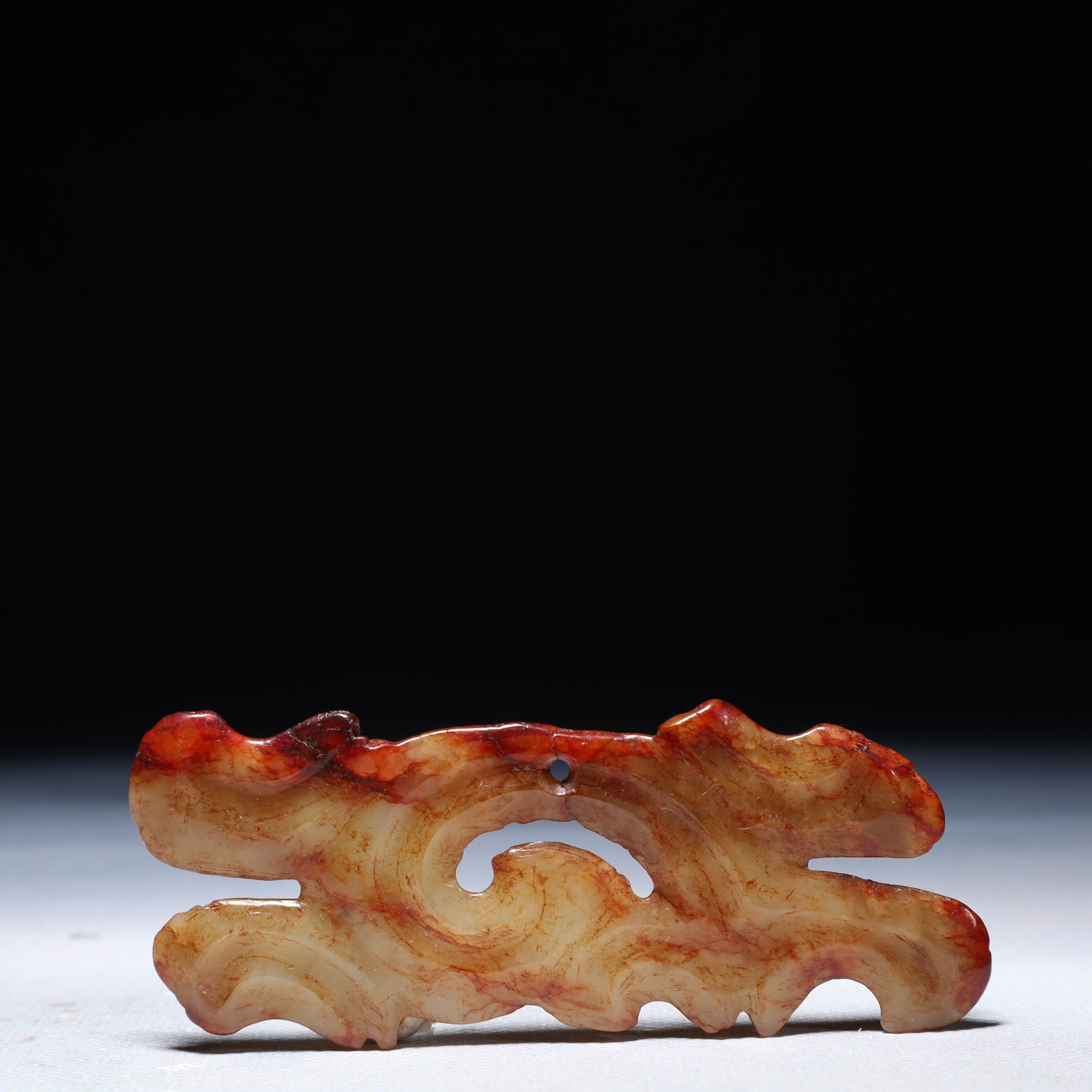 An Archaic Hongshan Culture White Jade Auspicious Cloud Pattern Pendant: An Archaic Hongshan Culture White Jade Auspicious Cloud Pattern Pendant,Ancient Time,China,Size:3.7inx1.4in,Weight:33.3g 红山文化白玉祥云纹挂