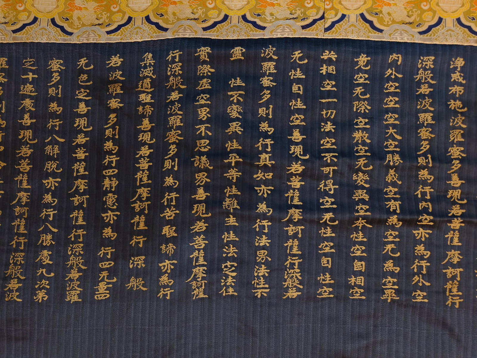 A beautifully woven thangka with images of Sakyamuni - 6