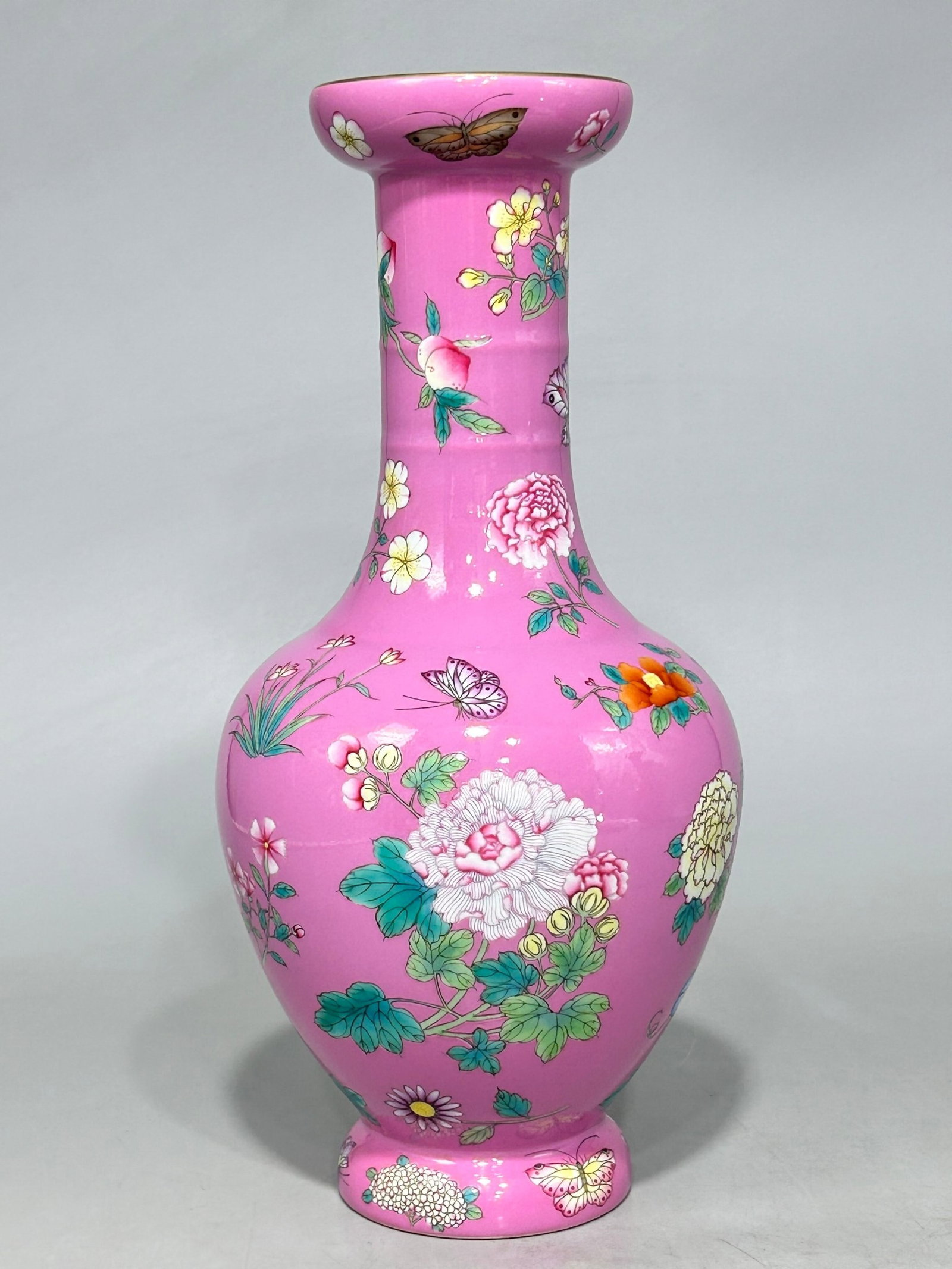 A Rare Famille-Rose Flower and Butterfly Pattern Vase: A Rare Famille-Rose Flower and Butterfly Pattern Vase,Qing Dynasty,China,Qianlong Six-character Mark,Size:13.1inx6.1in