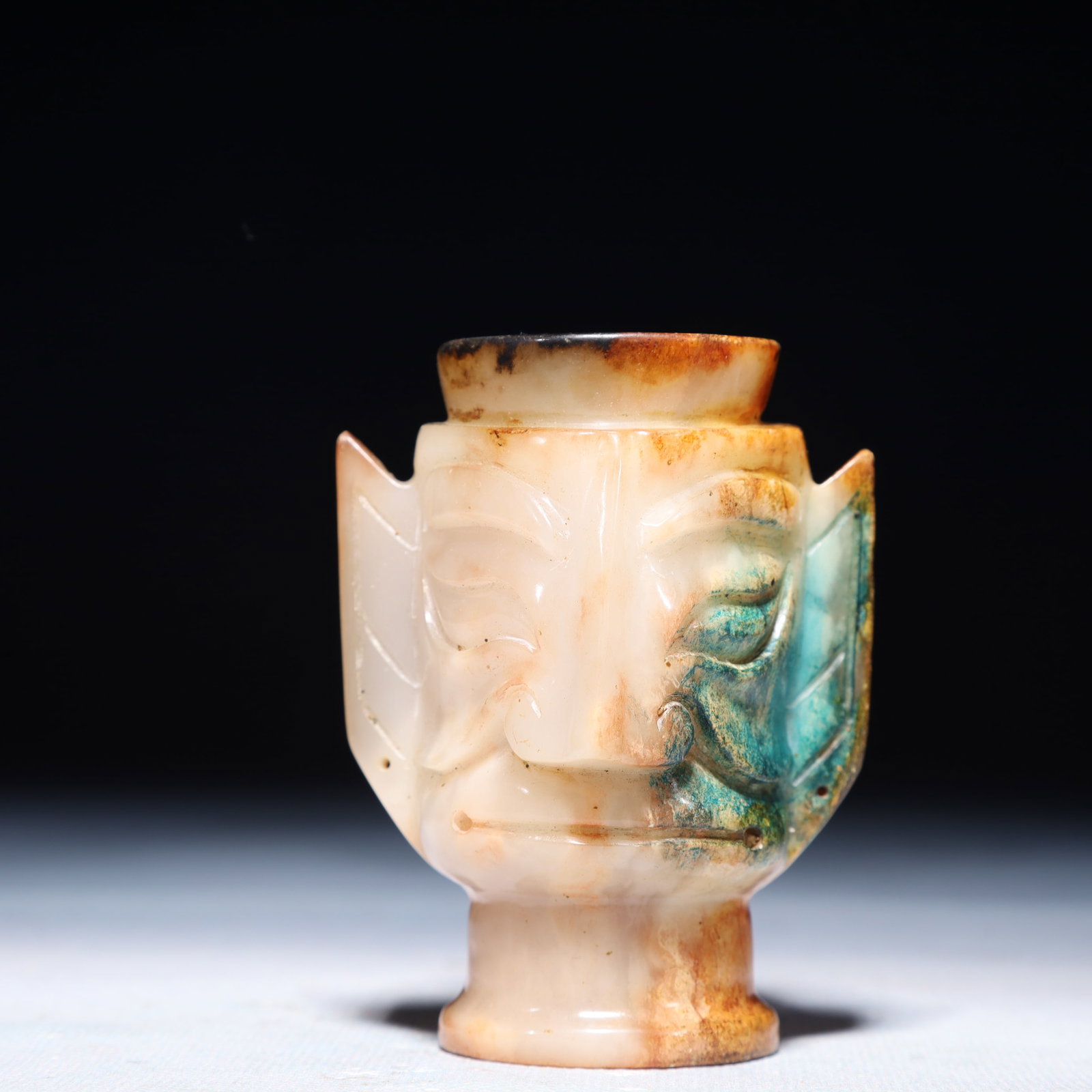 An Exquisite White Jade Figure-Face Pattern Ornament: An Exquisite White Jade Figure-Face Pattern Ornament,Qing Dynasty,China,Size:2.4inx3in,Weight:200g 白玉人面纹摆件,中国清代