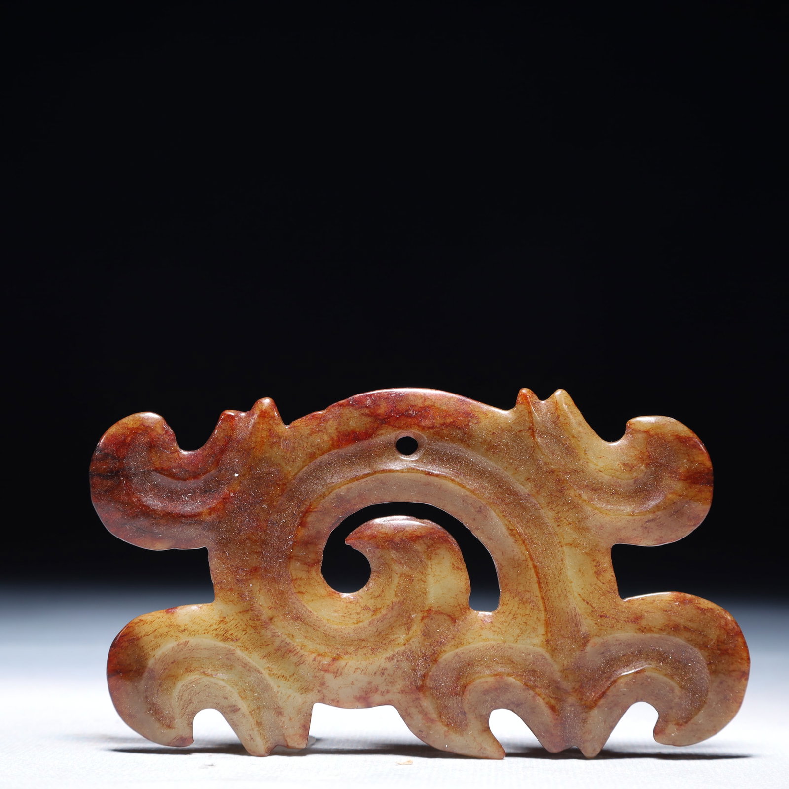 An Archaic Hongshan Culture Red Jade Auspicious Cloud Pattern Pendant: An Archaic Hongshan Culture Red Jade Auspicious Cloud Pattern Pendant,Ancient Time,China,Size:4.3inx2.4in,Weight:52.4g 红山文化红玉祥云纹挂&