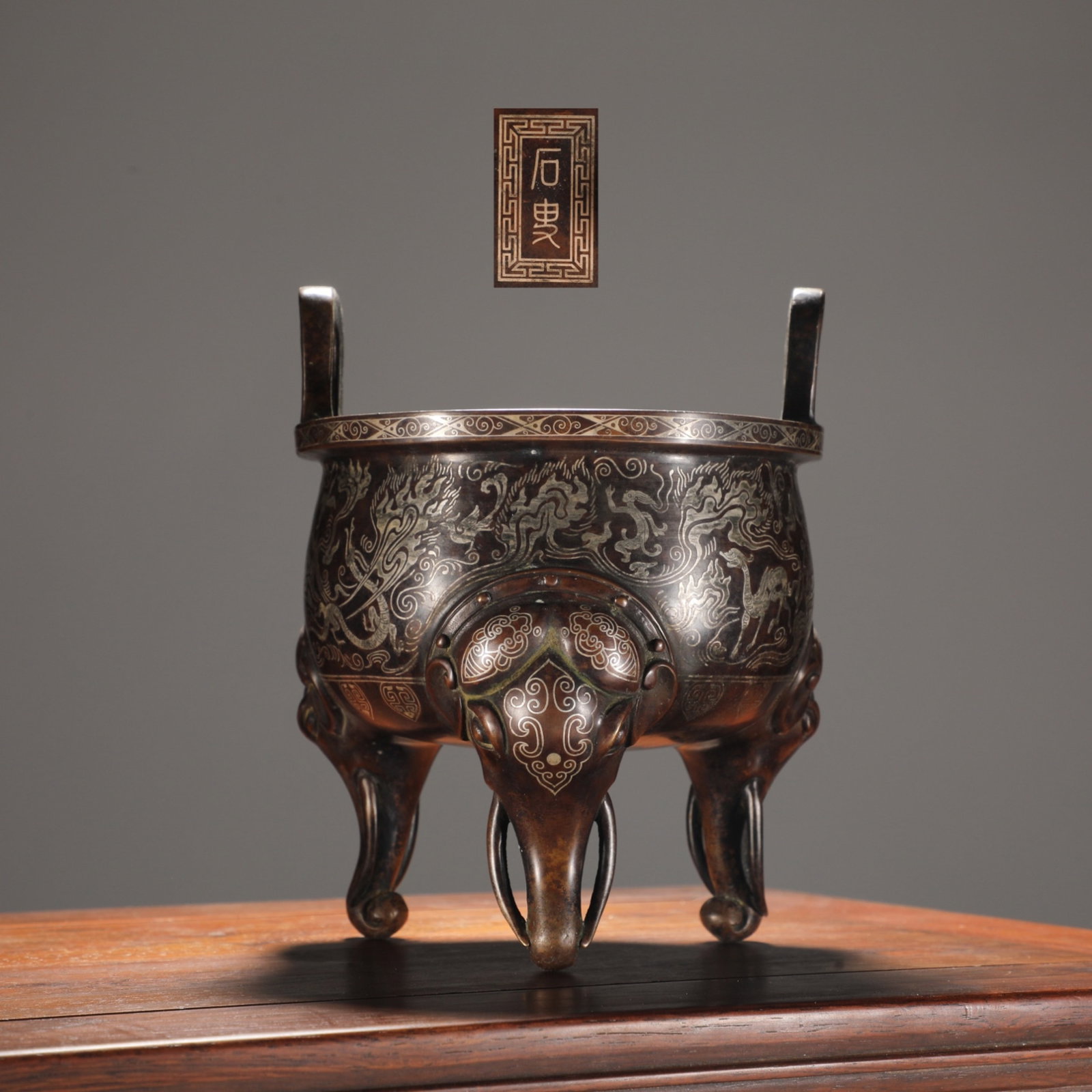 An Exquisite Bronze Inlaid Silver Phoenix Pattern Tripod Double-Ears Censer (1 of 9)