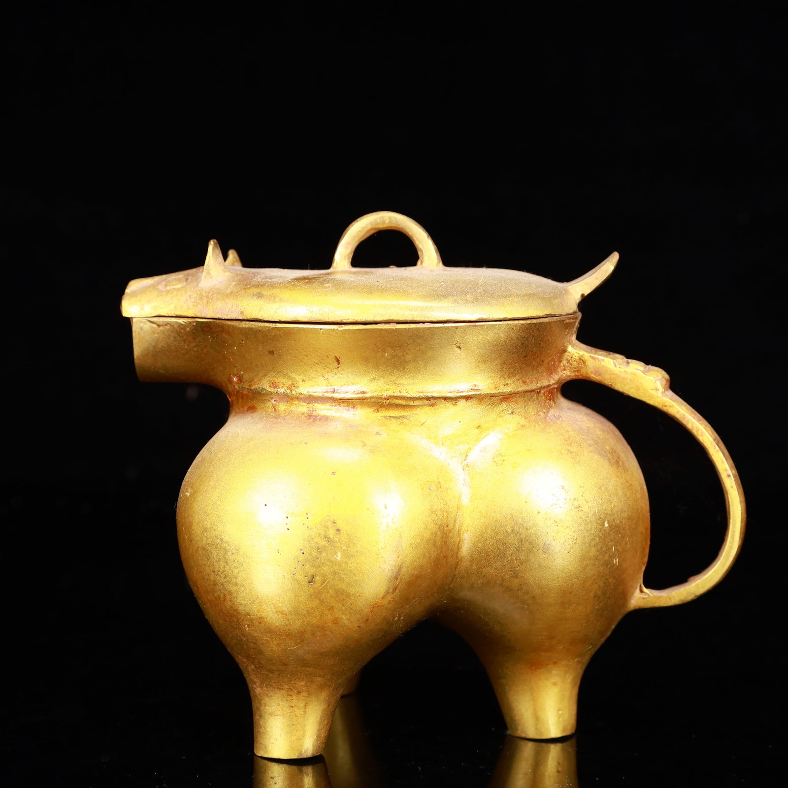 A Rare Gilt Bronze Beast Libation Cup: A Rare Gilt Bronze Beast Libation Cup,The Warring States period in China,Size:5.9inx4.3inx5.1in,Weight:1050g 铜鎏金兽酒杯,中国战国时&#