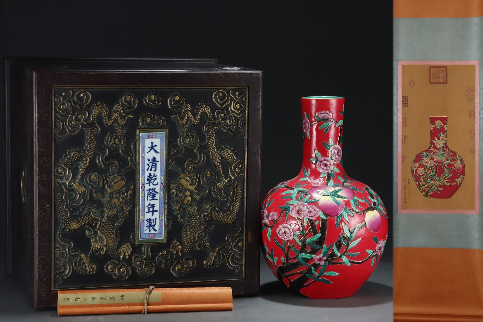 A Huge Red Glazed Enamel Painted Gold Flower and Peach Pattern Vase,with Chinese Vertical Scroll Ink: A Huge Red Glazed Enamel Painted Gold Flower and Peach Pattern Vase,with Chinese Vertical Scroll Ink Painting on Silk,Qing Dynasty,China,Qianlong Six-character Mark,Size:(Without frame)24inx12.4in,(Po