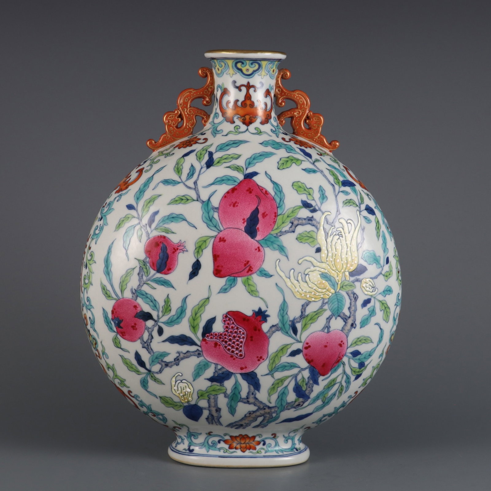 A Rare Doucai Painted Gold Bats and Peach Pattern Double-Ears Vase: A Rare Doucai Painted Gold Bats and Peach Pattern Double-Ears Vase,Qing Dynasty,China,Qianlong Six-character Mark,Size:12.7inx9.4in 斗彩描金福寿纹双 