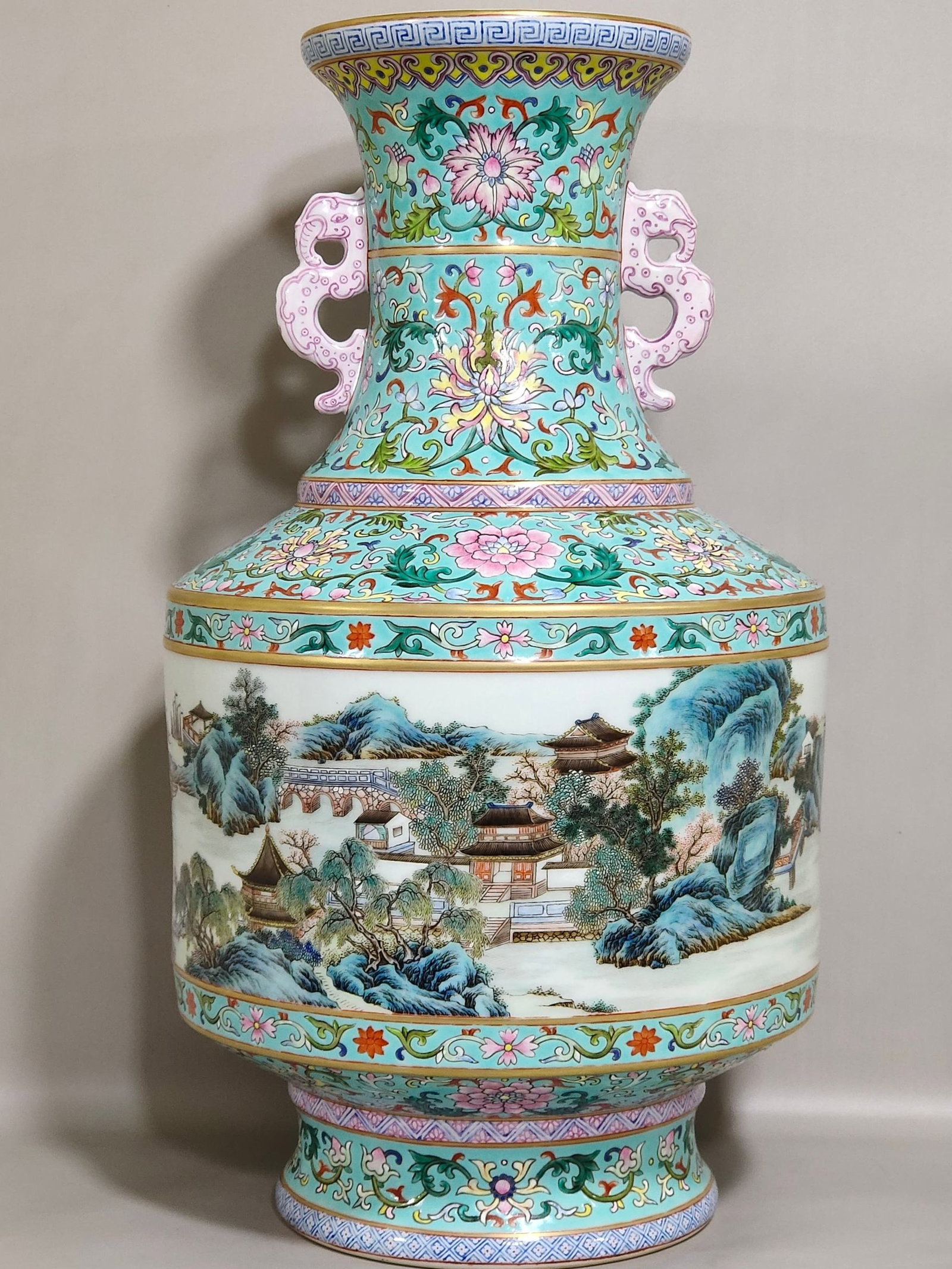 A Huge Green Ground Enamel Landscape Pattern Double-Ears Vase,with poem: A Huge Green Ground Enamel Landscape Pattern Double-Ears Vase,with poem,Qing Dynasty,China,Qianlong Six-character Mark,Size:19.1inx9.8in 绿地珐琅彩山水纹