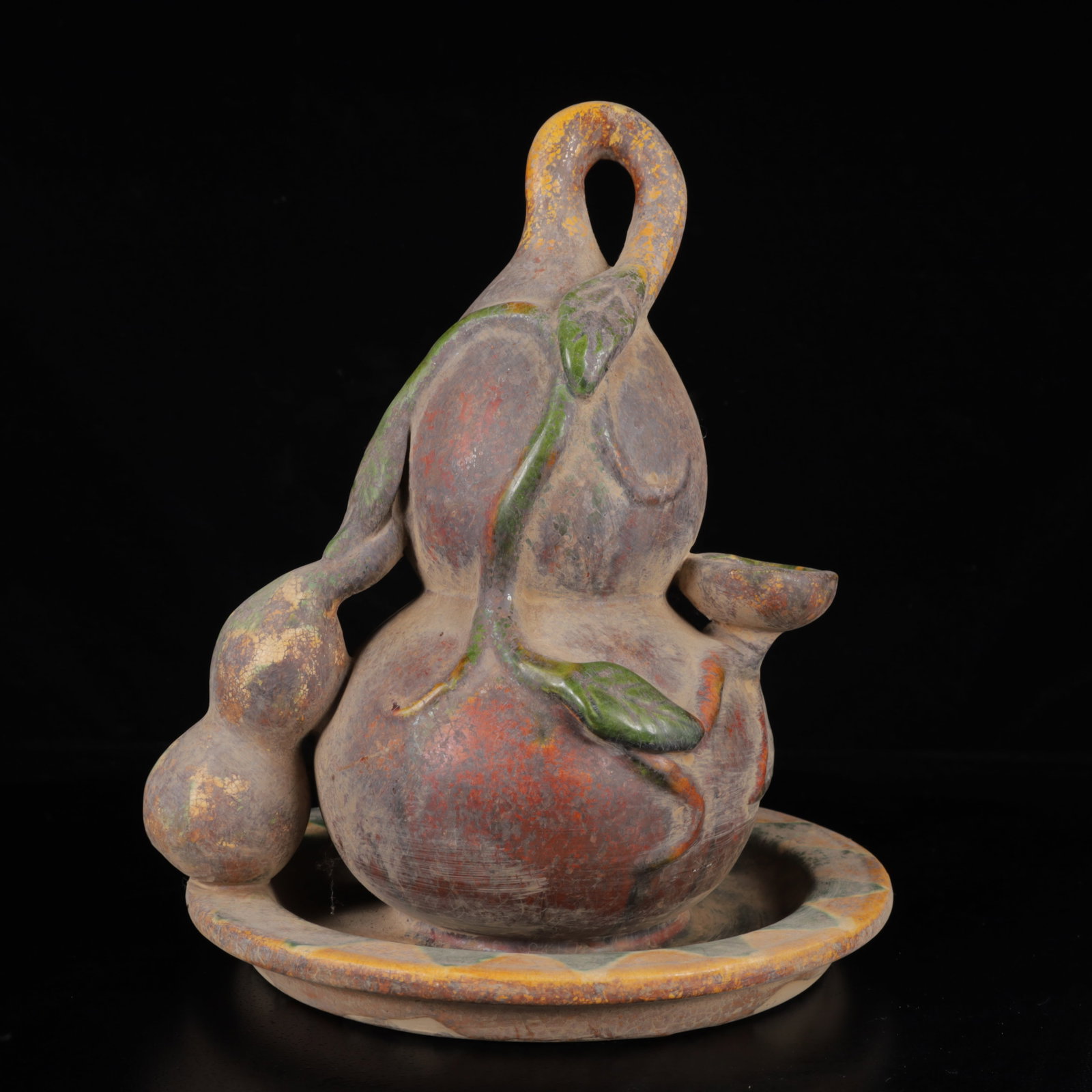 An Exquisite Tang Tri-Color Glazed Pottery Gourd-Shaped Ornament: An Exquisite Tang Tri-Color Glazed Pottery Gourd-Shaped Ornament,Tang Dynasty,China,Size:9.8inx8.7inx7.9in,Weight:1460g 唐三彩葫芦摆件,中国唐