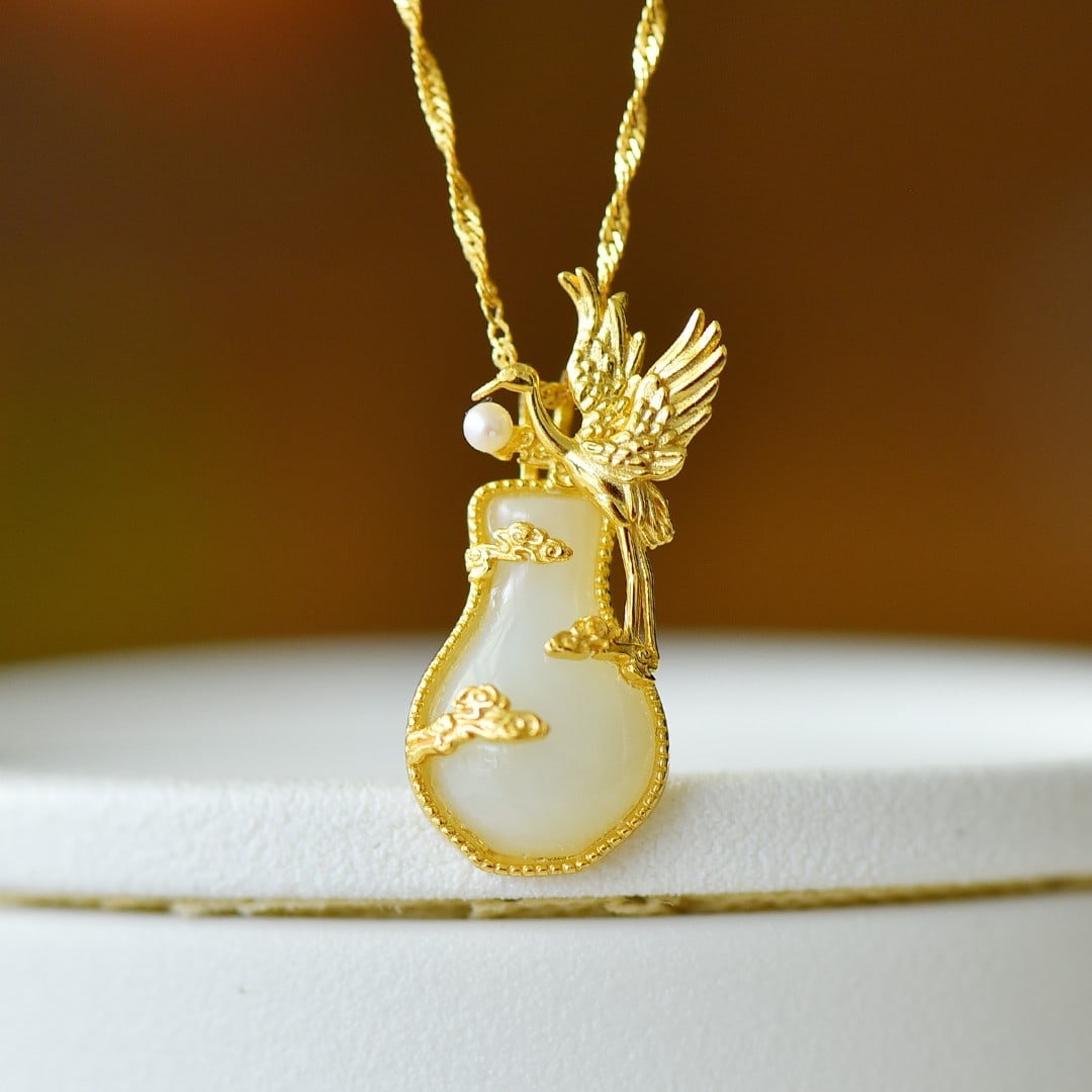An Exquisite Sterling Silver-Gold Plated Inlaid White Jade Pendant: An Exquisite Sterling Silver-Gold Plated Inlaid White Jade Pendant 纯银镀金镶白玉吊坠