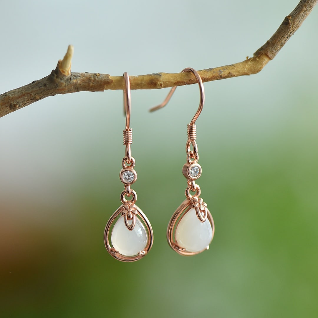 A Pair of Exquisite Sterling Silver-Gold Plated Inlaid White Jade Earrings: A Pair of Exquisite Sterling Silver-Gold Plated Inlaid White Jade Earrings,Size:0.2inx0.3in 一对纯银镀金镶白玉耳环