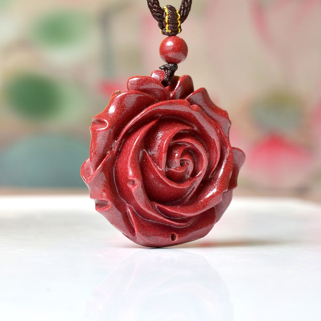 An Exquisite Cinnabar Flower Pendant: An Exquisite Cinnabar Flower Pendant,Size:1.4inx1.4in,Weight:26.9g 朱砂花卉挂件