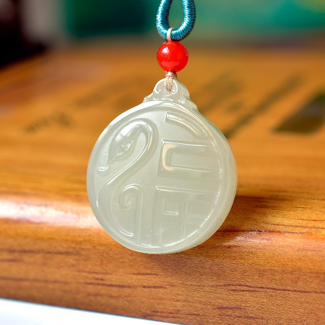 An Exquisite White Jade Fu-Character Pattern Pendant: An Exquisite White Jade Fu-Character Pattern Pendant,Size:1inx1.1in 白玉福字纹挂件