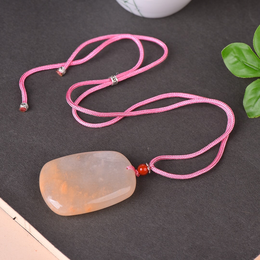 An Exquisite Red Jade Pendant: An Exquisite Red Jade Pendant,Size:1.3inx1.9in 红玉挂件