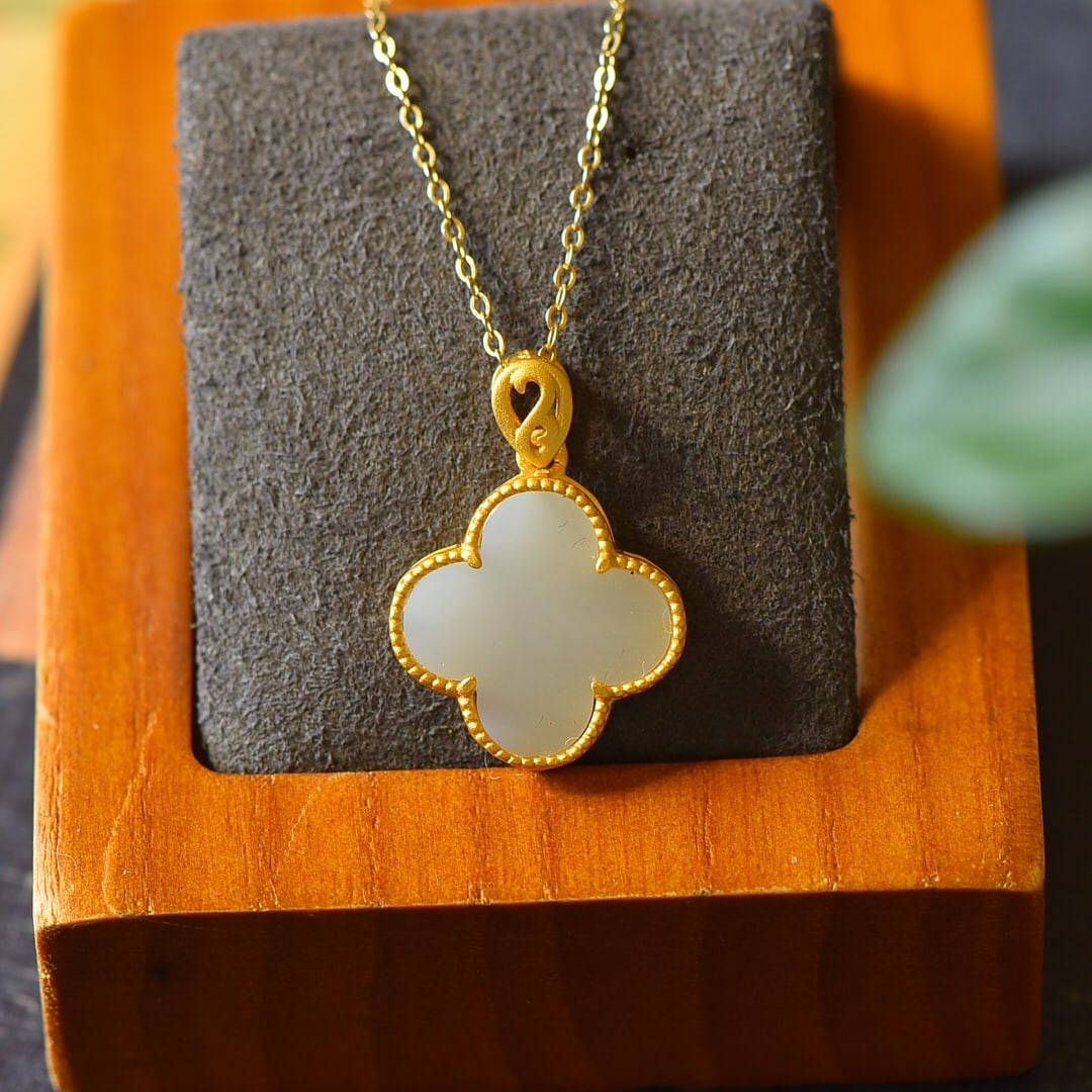 An Exquisite Sterling Silver-Gold Plated Inlaid White Jade Necklace: An Exquisite Sterling Silver-Gold Plated Inlaid White Jade Necklace,Size:0.6inx0.9in 纯银镀金镶白玉项链