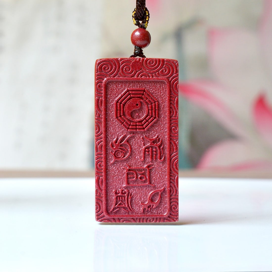 An Exquisite Cinnabar Trigram Pattern Pendant: An Exquisite Cinnabar Trigram Pattern Pendant,Size:0.9inx1.9in,Weight:29.2g 朱砂八卦纹挂件