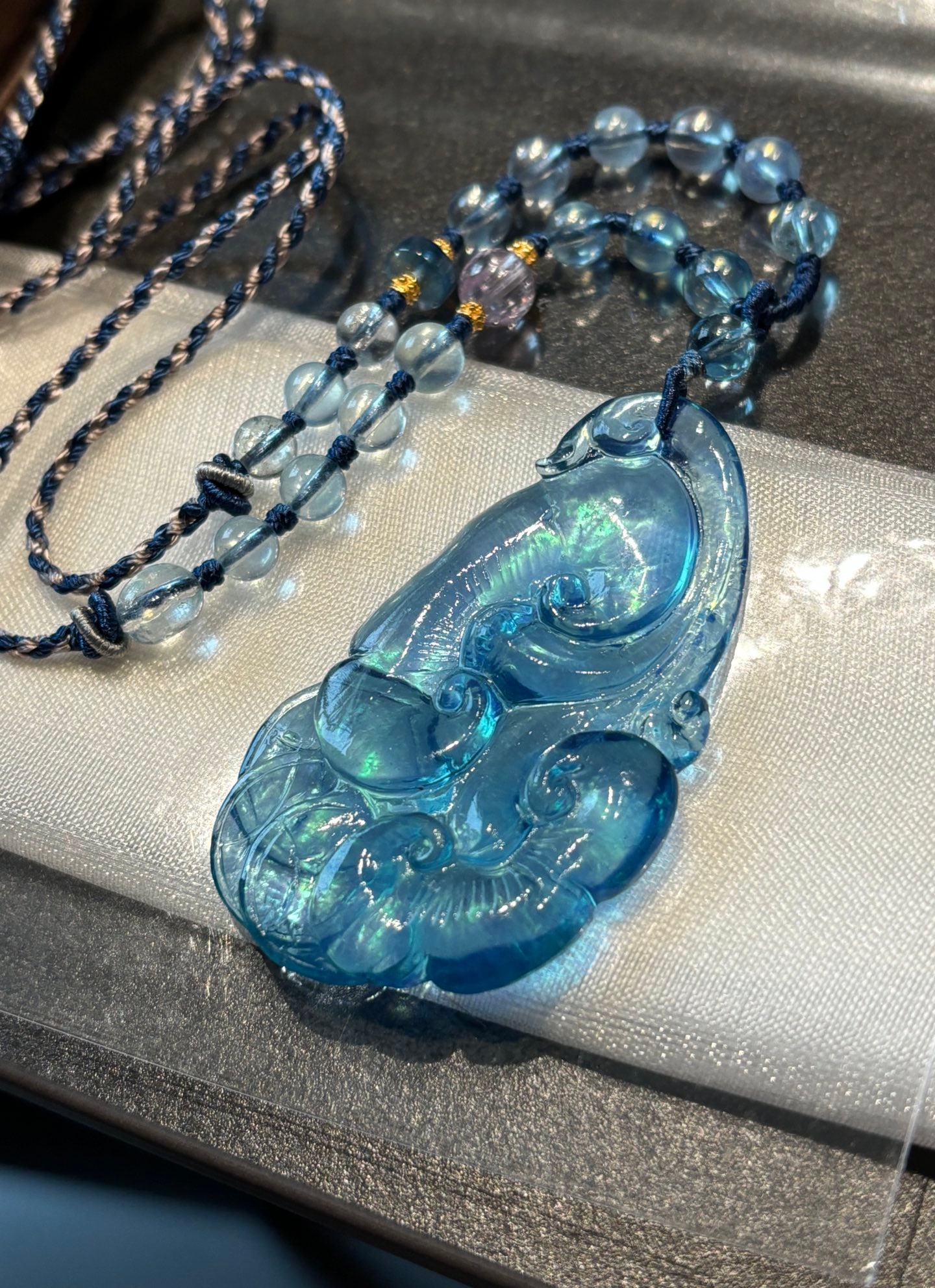 An Exquisite Aquamarine Ruyi Necklace: An Exquisite Aquamarine Ruyi Necklace,Size:2.1inx1.2inx0.3in,Weight:21.8g 海蓝宝如意吊坠
