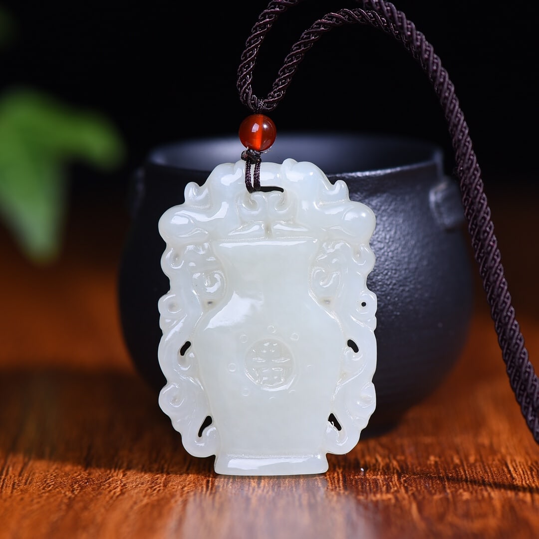 An Exquisite White Jade Vase Pendant (1 of 5)