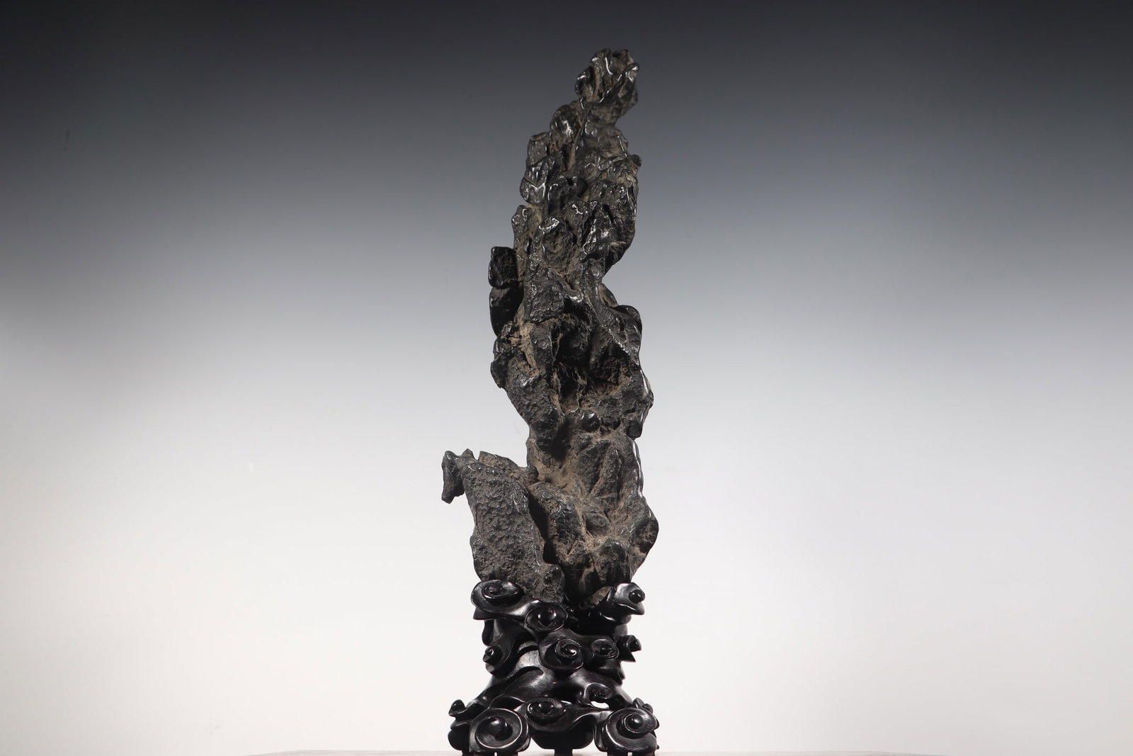 A Exquisite Taihu Stone Mountain Ornament: A Exquisite Taihu Stone Mountain Ornament,Qing Dynasty, China,Size:4.3inx4.3inx15.9in,Weight:2300g 太湖石山形摆件,中国清代