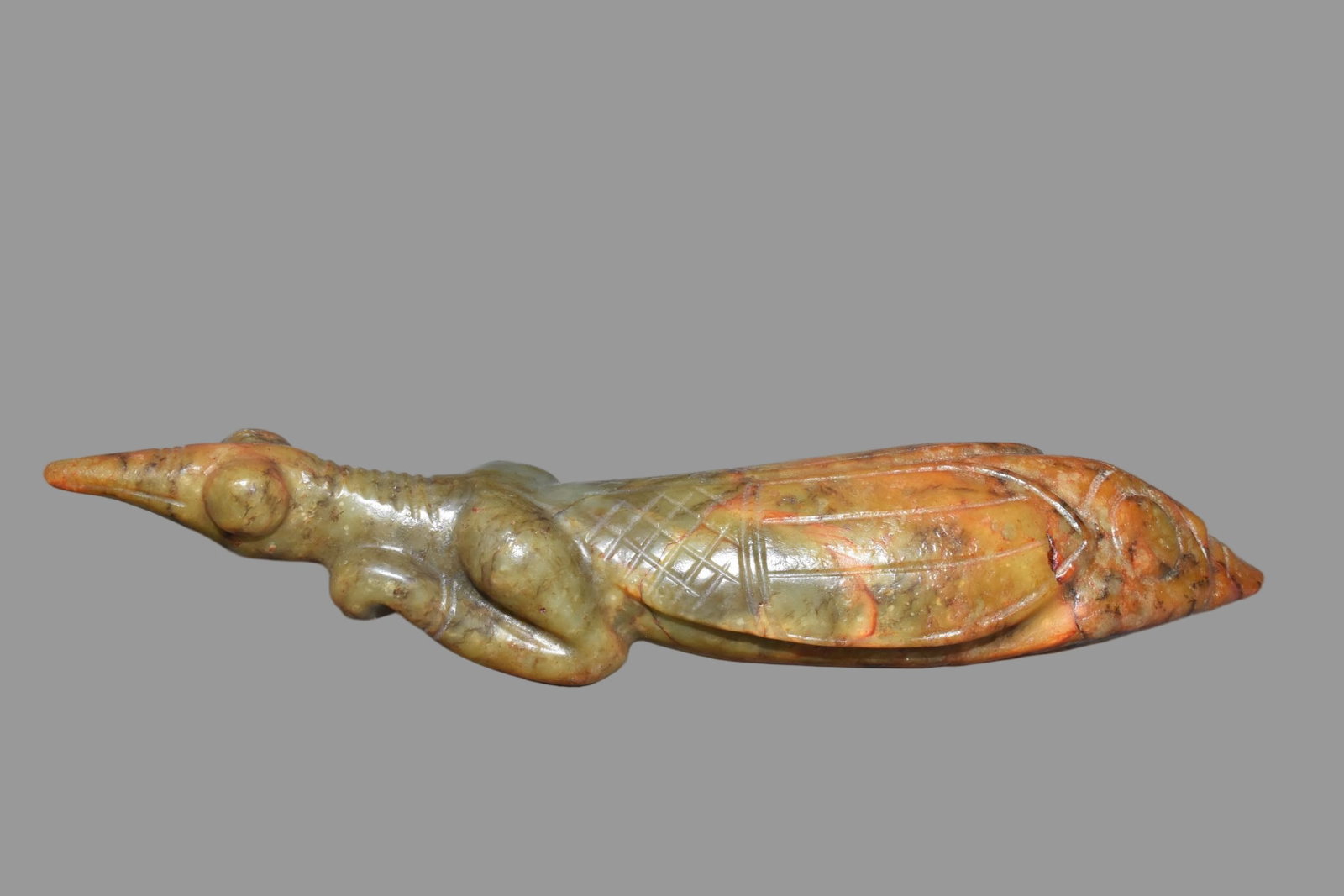 A Exquisite Hemoyu Ornament: A Exquisite Hemoyu Ornament,Ancient Time, China,Size:10inx2.6in,Weight:770g 河磨玉摆件,远古时期