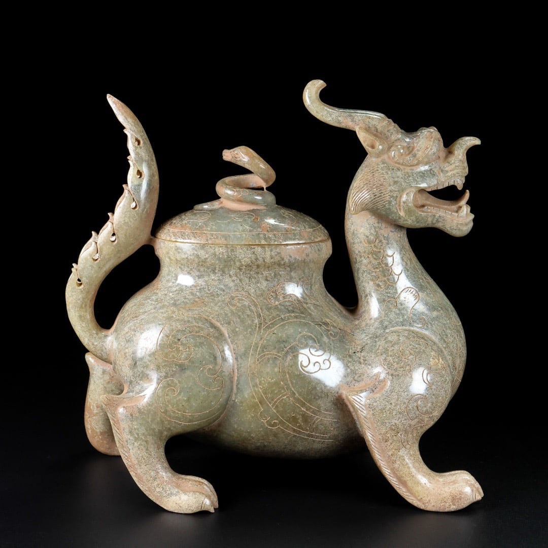 A Exquisite Hotan Jade Auspicious Beast Ornament: A Exquisite Hotan Jade Auspicious Beast Ornament,Han Dynasty, China,With Mark,Size:6.7inx3.9inx6.3in,Weight:1109g
