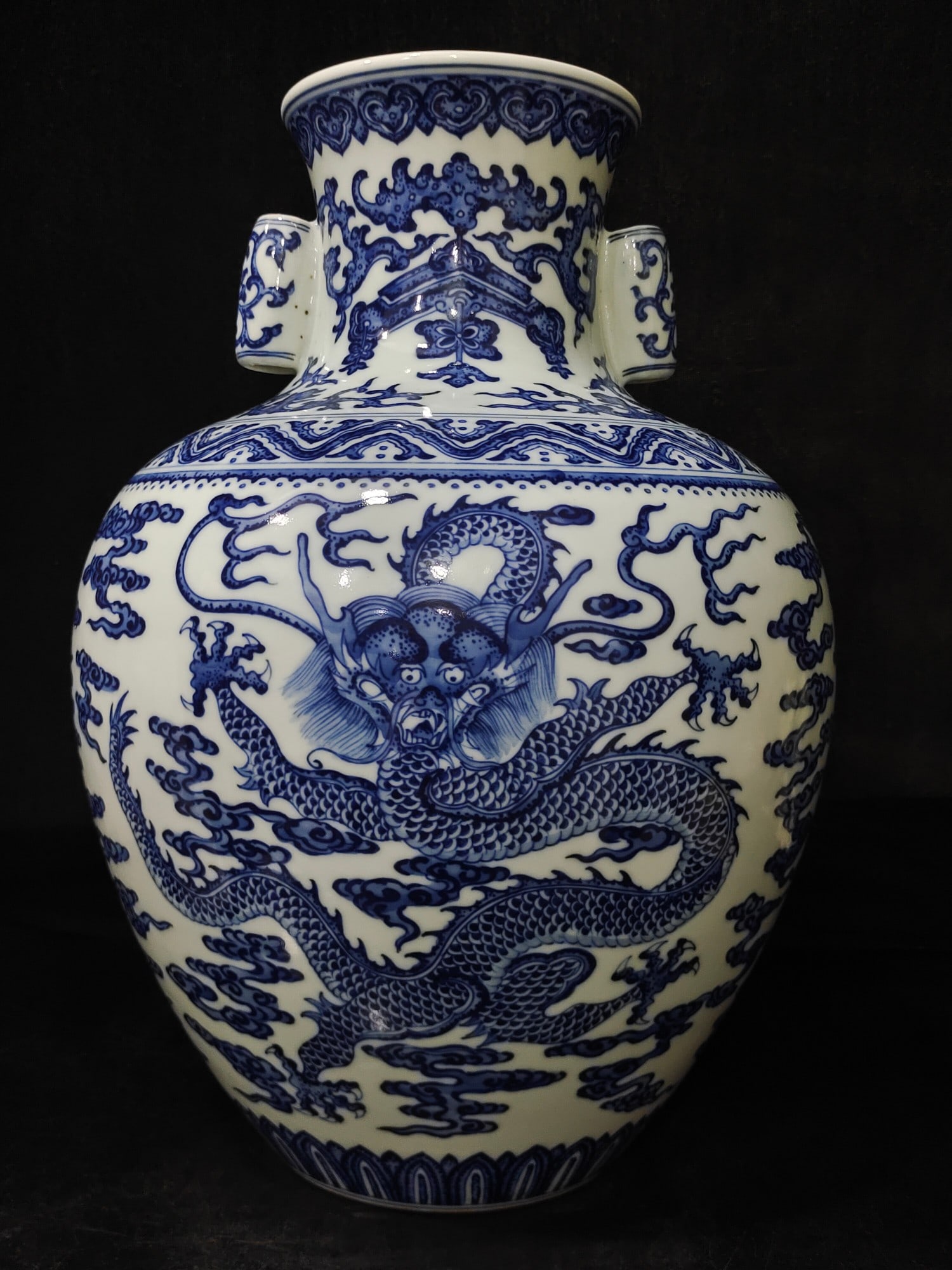 A Exquisite Blue and White Dragon Pattern Double-Ears Vase: A Exquisite Blue and White Dragon Pattern Double-Ears Vase,Qing Dynasty, China,Qianlong Six-character Mark,Size:14.2inx10.2inx4.7in