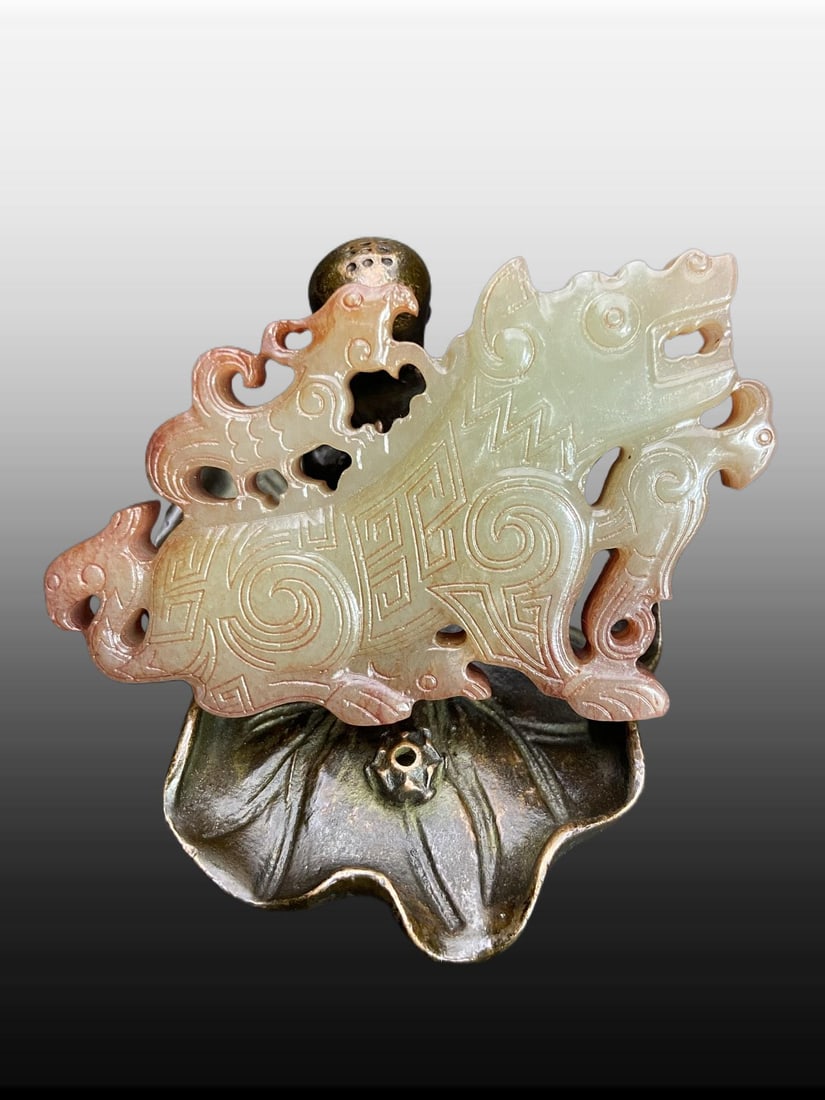 A Exquisite Hotan Jade Auspicious Beast Pendant: A Exquisite Hotan Jade Auspicious Beast Pendant,Han Dynasty, China,Size:2.9inx1.9inx0.4in,Weight:52g 和田玉瑞兽挂件,中国汉代