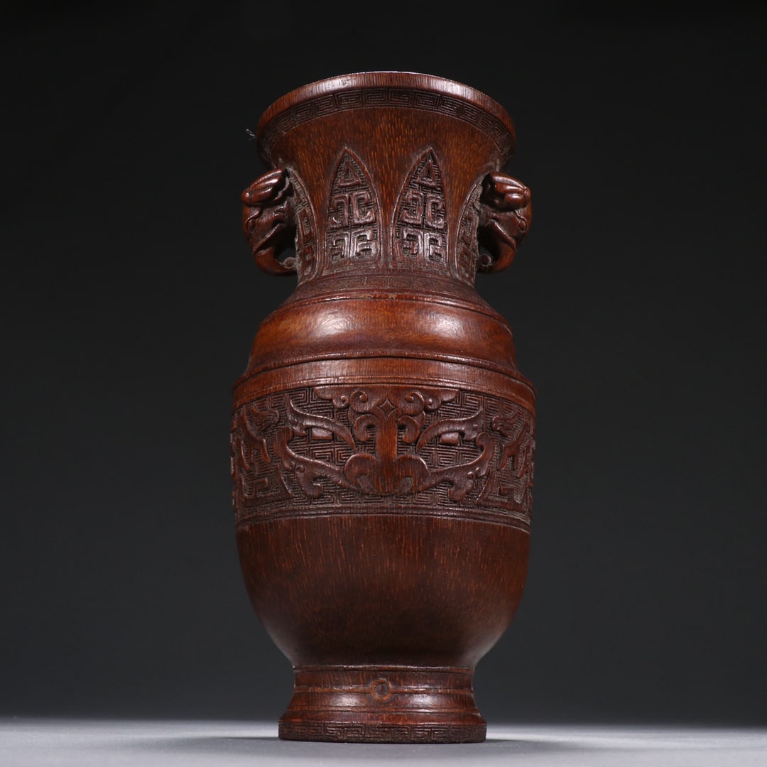 A Exquisite Bamboo Beast-Face Pattern Elephant-Ears Vase: A Exquisite Bamboo Beast-Face Pattern Elephant-Ears Vase,Qing Dynasty, China,Size:10.2inx4.5in 竹雕饕餮纹象耳瓶,中国清代