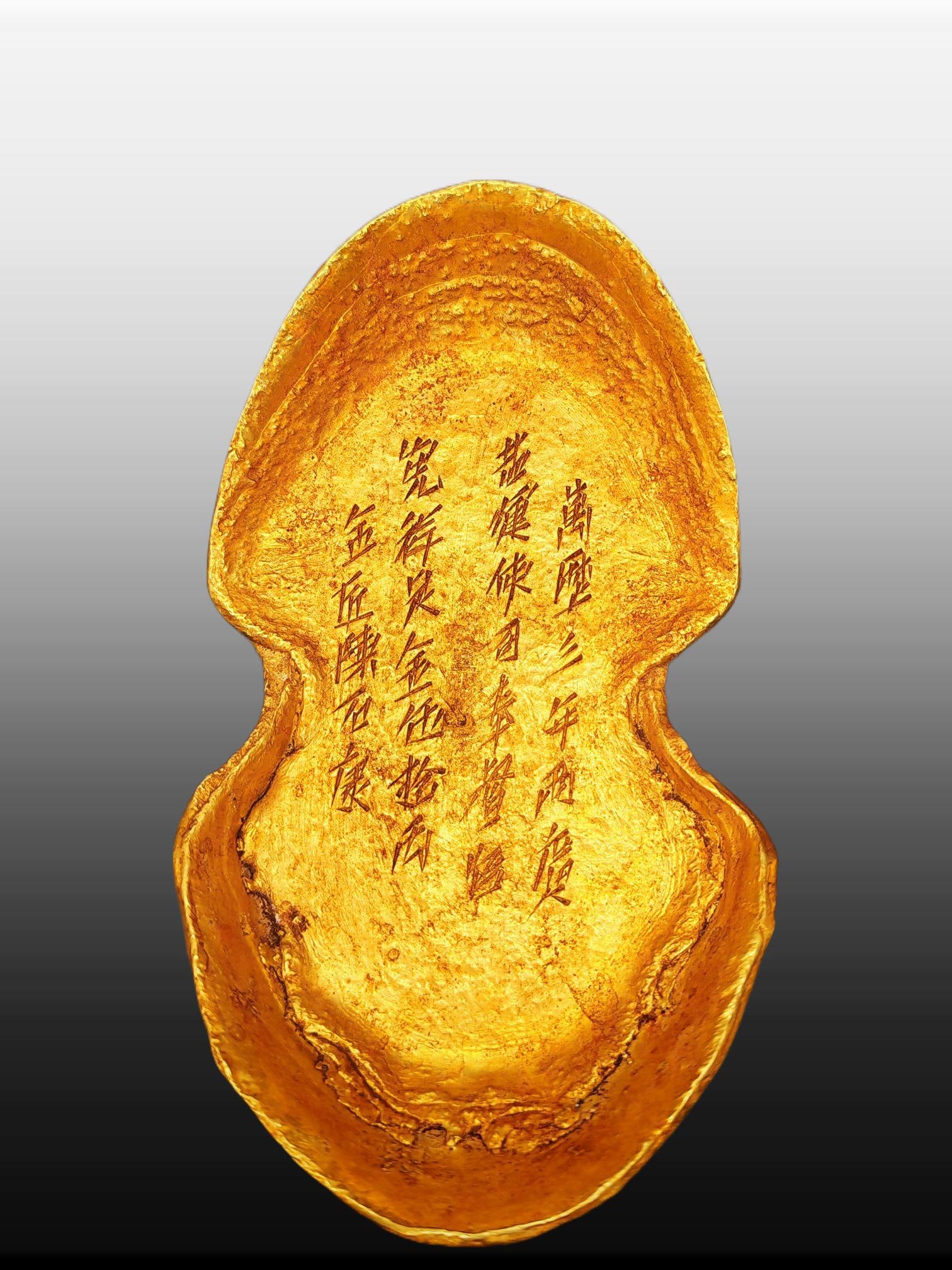 A Exquisite Gilt Bronze Gold ingot Ornament: A Exquisite Gilt Bronze Gold ingot Ornament,Ming Dynasty, China,Size:5.9inx3.1inx2in 铜鎏金元宝摆件,中国明代