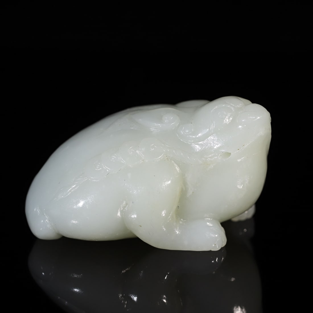A Exquisite Hotan Jade Golden Toad Ornament: A Exquisite Hotan Jade Golden Toad Ornament,Qing Dynasty, China,Size: 3.3inx 2.2inx 1.9in 和田玉金蟾摆件,中国清代