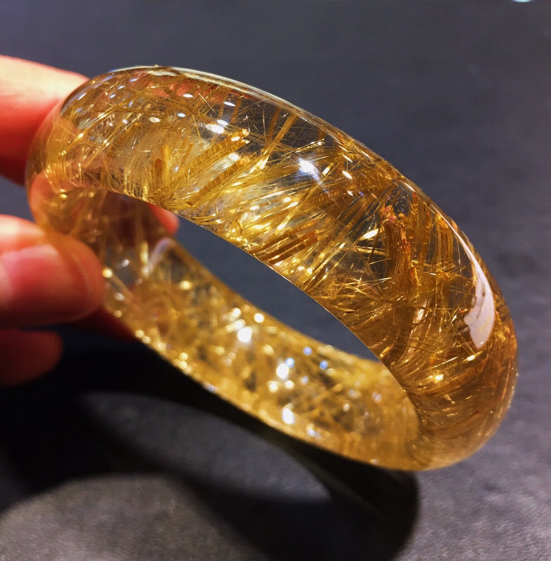 A Exquisite Titanium Quartz Bracelets: Titanium Quartz Bracelets,Qing Dynasty, China,Size:2.1inx0.7inx0.4in, Weight:81g 钛晶手镯,中国清代