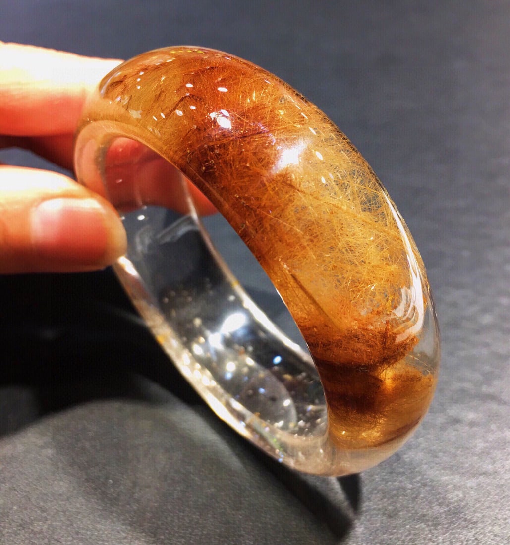 A Exquisite Rutilated Quartz Bracelets: Rutilated Quartz Bracelets,Qing Dynasty, China,Size:2.1inx0.8inx0.4in, Weight:80g 发晶手镯,中国清代