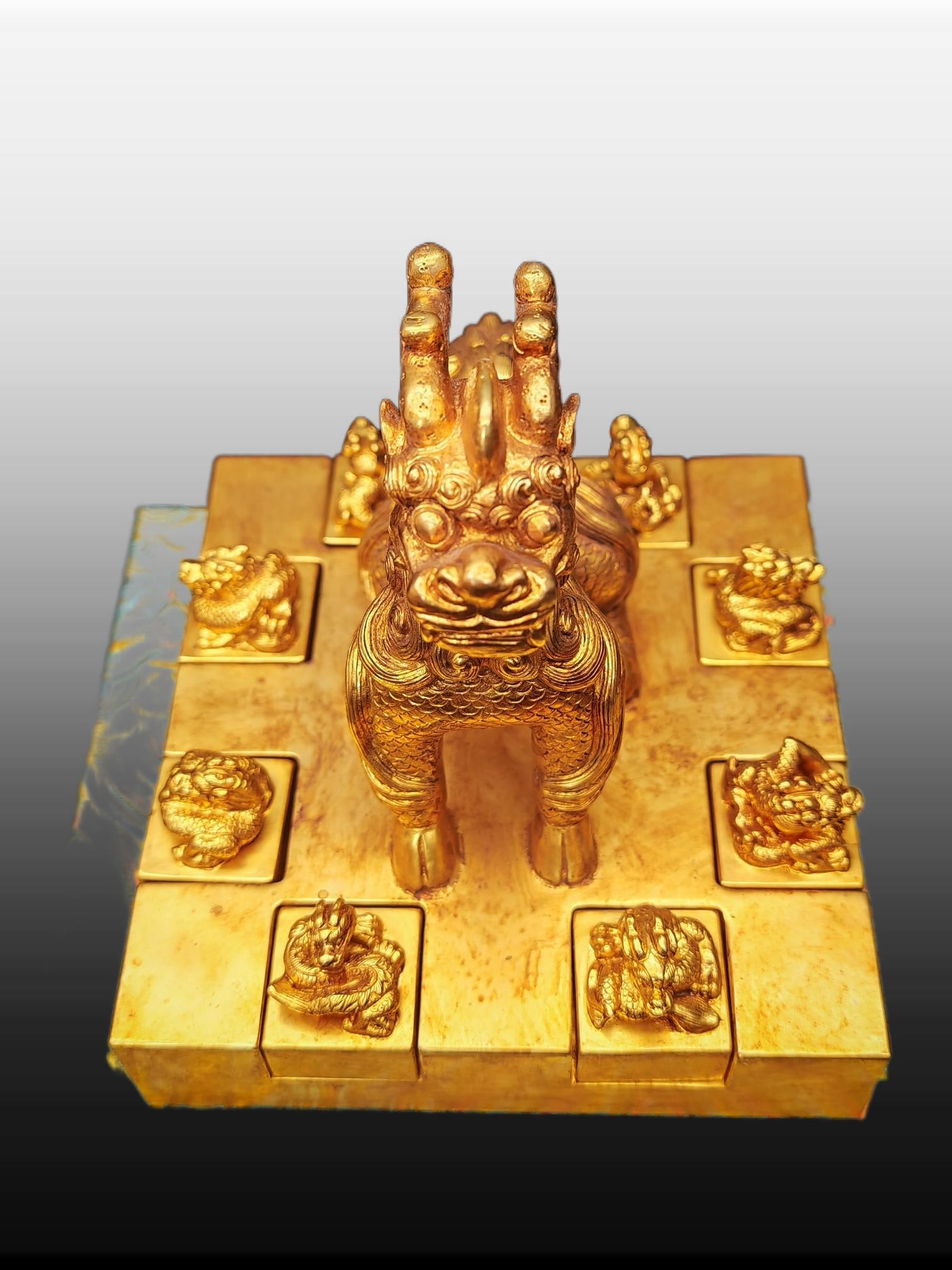 A Exquisite Gilt Bronze Kylin Seal: A Exquisite Gilt Bronze Kylin Seal,Qing Dynasty, China,Size:5.7inx6.3in 铜鎏金麒麟印章,中国清代