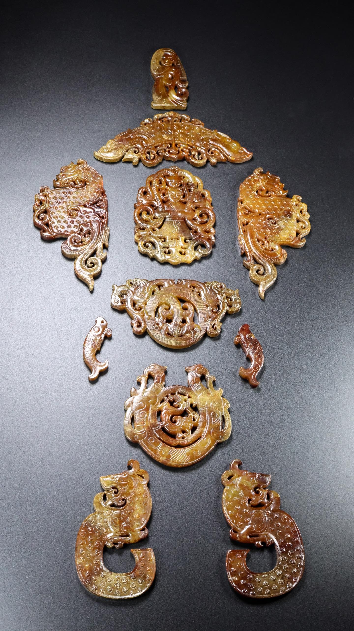A Set of Exquisite Hotan Jade Bi: A Set of Exquisite Hotan Jade Bi,Han Dynasty, China,Size:20.5inx8.7inx0.2in,Weight:405g 一套和田玉玉璧,中国汉代