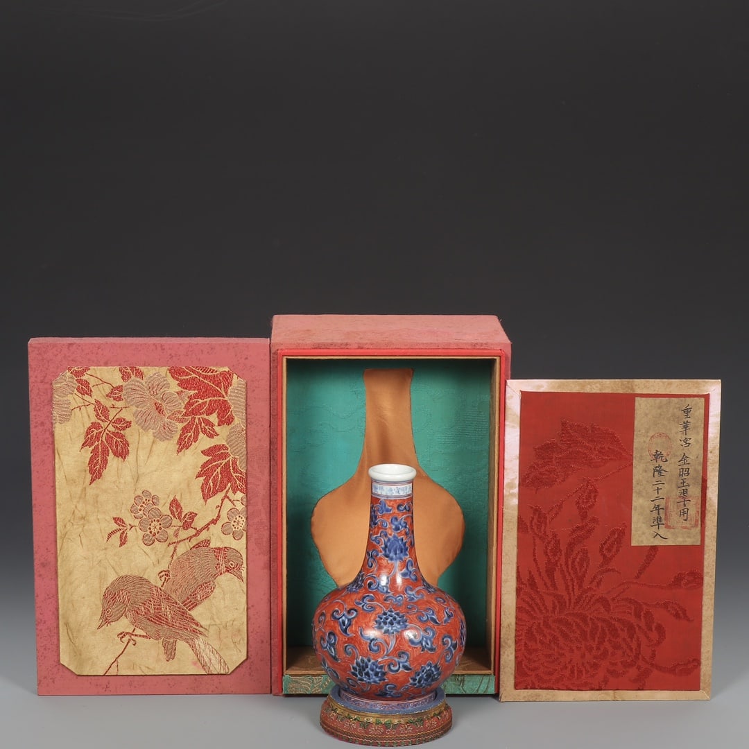A Exquisite Iron-Red Blue and White Lotus Pattern Vase: A Exquisite Iron-Red Blue and White Lotus Pattern Vase,Ming Dynasty, China,Xuande Six-character Mark,Size:7.9inx1.5inx5.3in 矾红青花缠枝莲纹瓶,