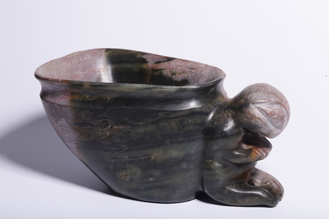 A Exquisite Gaogu Jade Figures Cup: A Exquisite Gaogu Jade Figures Cup,Ancient Time, China,With Mark,Size:3.5inx7.7inx4.5in ,Weight:1866g 高古玉人物杯,远古时期,带款