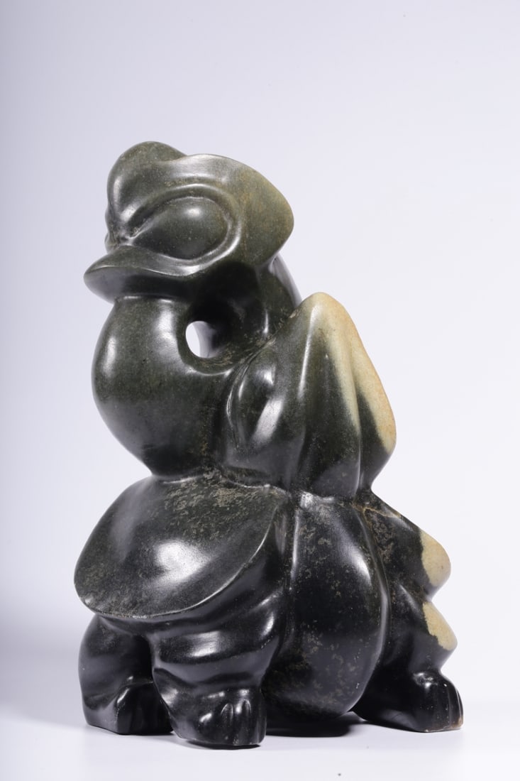 A Exquisite Gaogu Jade Pig Dragon Ornament: A Exquisite Gaogu Jade Pig Dragon Ornament,Ancient Time, China,Size:4.3inx4.3inx7.9in ,Weight:2250g 高古玉猪龙摆件,远古时期