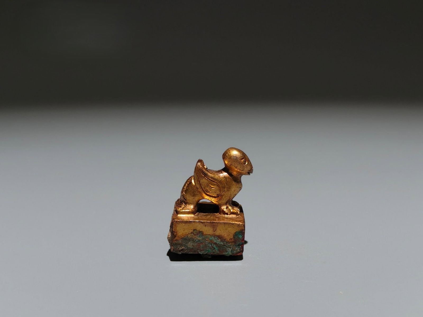 A Exquisite Gilt Bronze Auspicious Beast Seal: A Exquisite Gilt Bronze Auspicious Beast Seal,Han Dynasty, China,Size:1.2inx0.8in,Weight:g 铜鎏金瑞兽印章,中国汉代