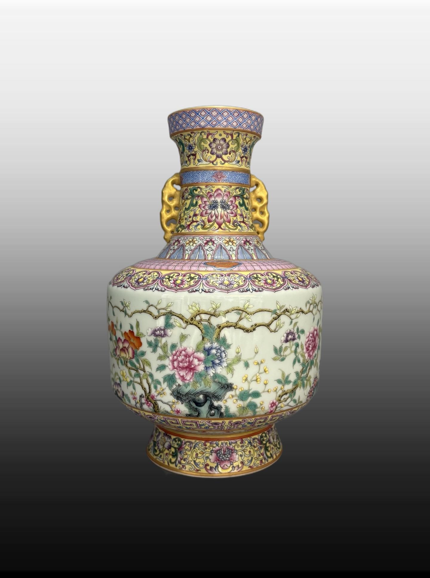 A Exquisite Yellow Ground Famille-Rose Painted Gold Flower and Bird Pattern Double-Ears Vase: A Exquisite Yellow Ground Famille-Rose Painted Gold Flower and Bird Pattern Double-Ears Vase,Qing Dynasty, China,Qianlong Four-character Mark,Size:12.6inx8.3in