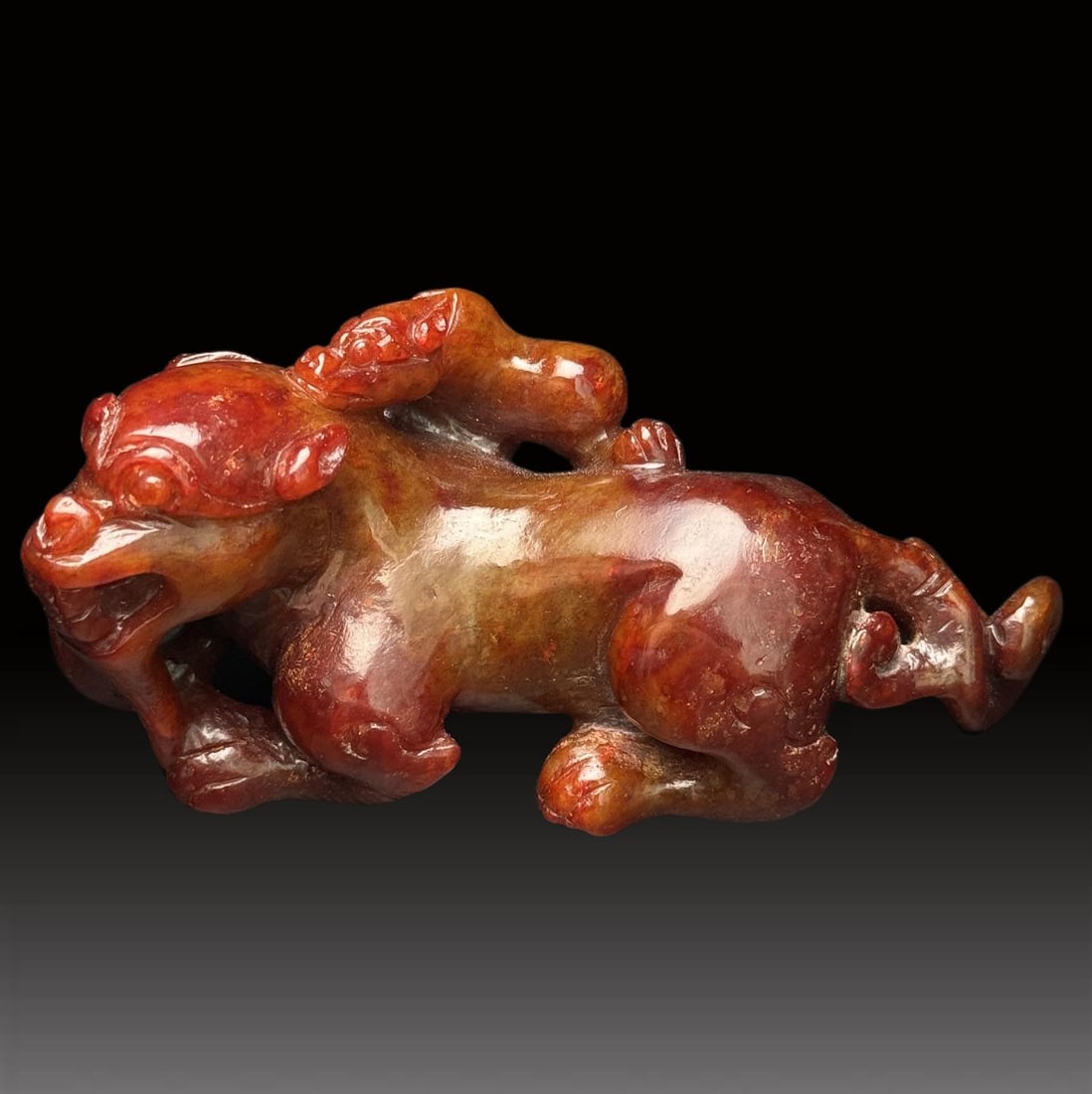 A Exquisite Hotan Jade Auspicious Beast Ornament: A Exquisite Hotan Jade Auspicious Beast Ornament,Han Dynasty, China,Size:4.2inx1.8inx2in,Weight:206g 和田玉瑞兽摆件,中国汉代