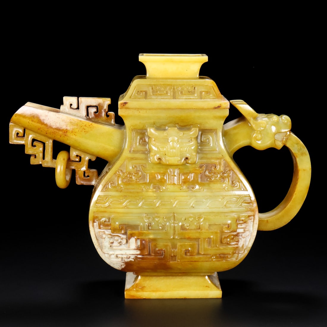 A Set of Exquisite Hotan Jade Beast-Face Pattern Goblet: A Set of Exquisite Hotan Jade Beast-Face Pattern Goblet,Han Dynasty, China,Size:3.1inx10.2inx8.3in,Weight:2159g 一套和田玉兽面纹酒器,中