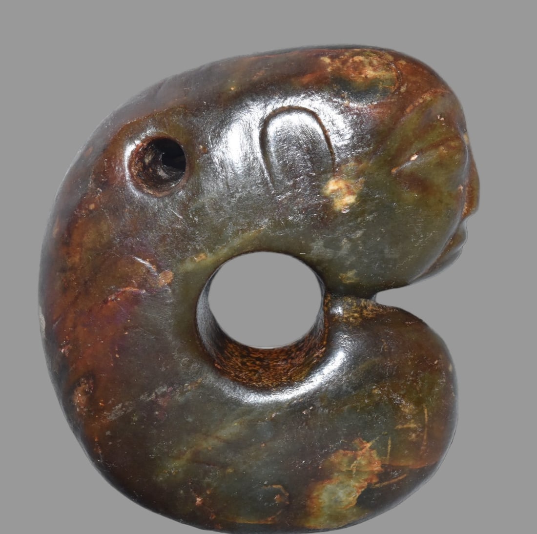 A Exquisite Hemoyu Pig Dragon: A Exquisite Hemoyu Pig Dragon,Ancient Time, China,Size:4inx3.9in,Weight:430g 河磨玉猪龙,远古时期