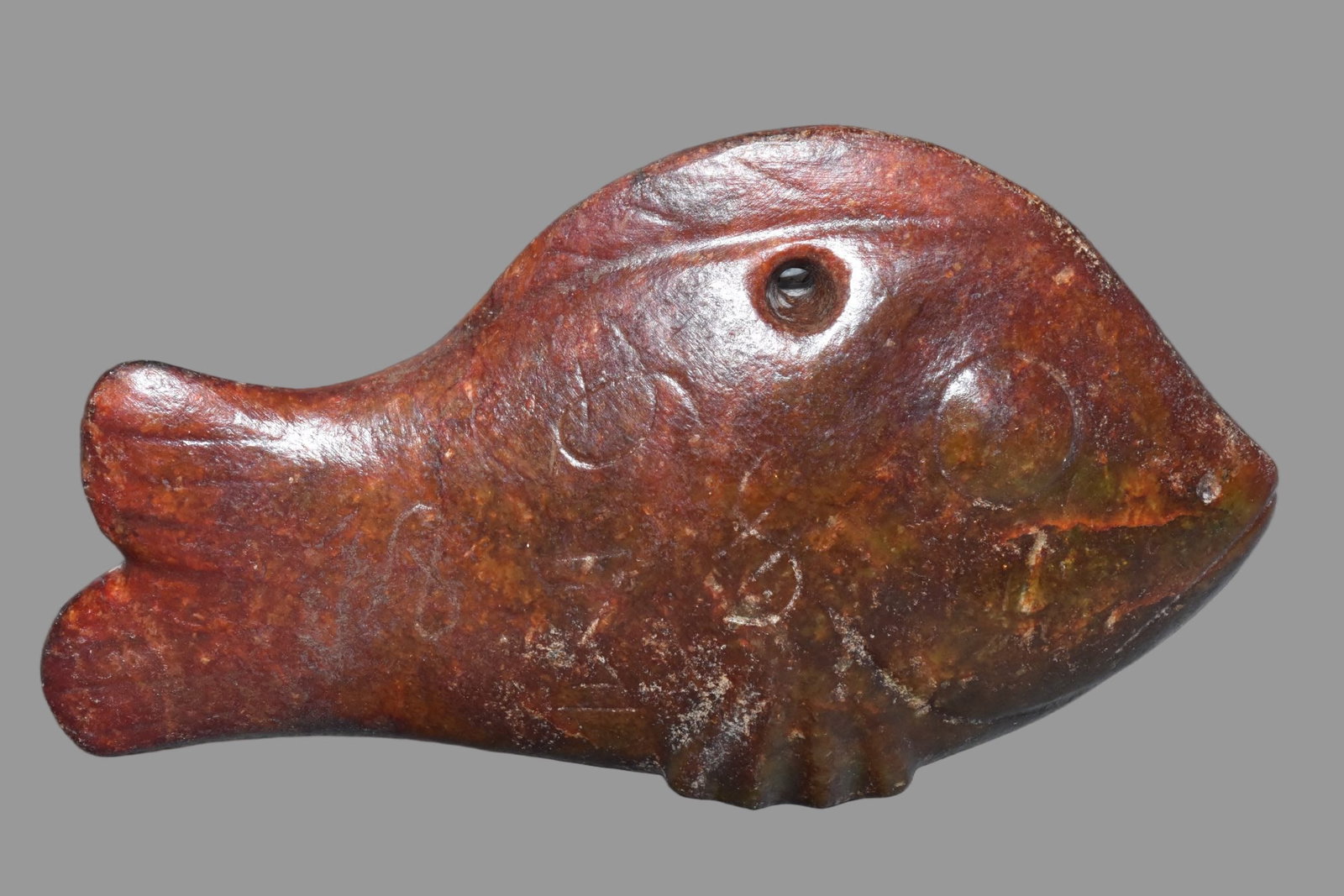 A Exquisite Hemoyu Fish: A Exquisite Hemoyu Fish,Ancient Time, China,Size:5.8inx3.7in,Weight:450g 河磨玉鱼,远古时期