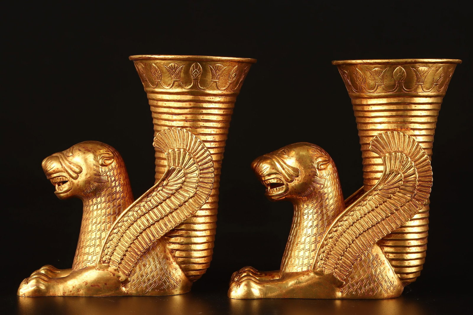 A pair of Exquisite Gilt Bronze Lion Pattern Cup: A pair of Exquisite Gilt Bronze Lion Pattern Cup,Qing Dynasty, China,Size:7.1inx5.9in,Weight:893g 一对铜鎏金狮子杯,中国清代