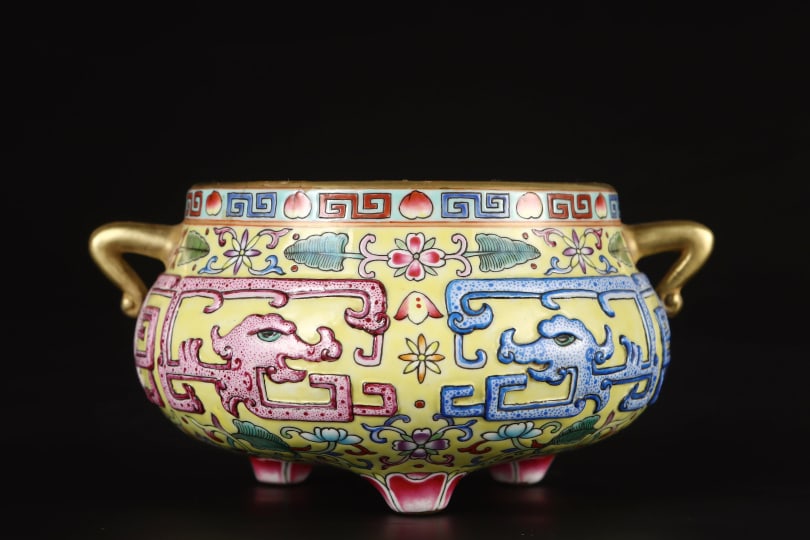 A Exquisite Yellow Ground Enamel Double-Ears and Tripod Censer: A Exquisite Yellow Ground Enamel Double-Ears and Tripod Censer,Qing Dynasty, China,Qianlong Six-character Mark,Size:2.3inx4.7in