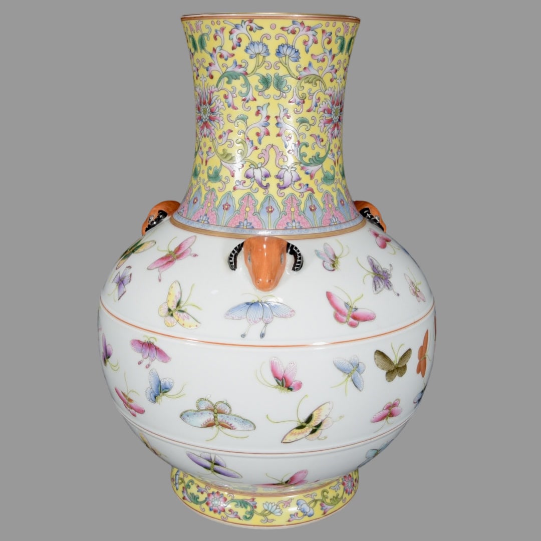 A Exquisite Famille-Rose Flower and Butterfly Pattern Vase: A Exquisite Famille-Rose Flower and Butterfly Pattern Vase,Qing Dynasty, China,Qianlong Six-character Mark,Size:13.4inx9.4in