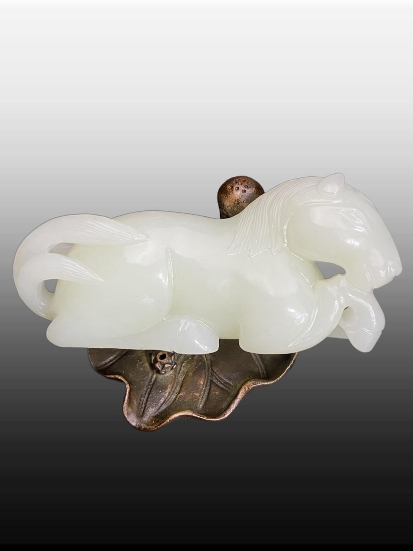 A Exquisite Hotan Jade Horse Handheld Carving: A Exquisite Hotan Jade Horse Handheld Carving,Ming Dynasty, China,Size:3.9inx1.8inx1.3in,Weight:188g 和田玉马手把件,中国明代