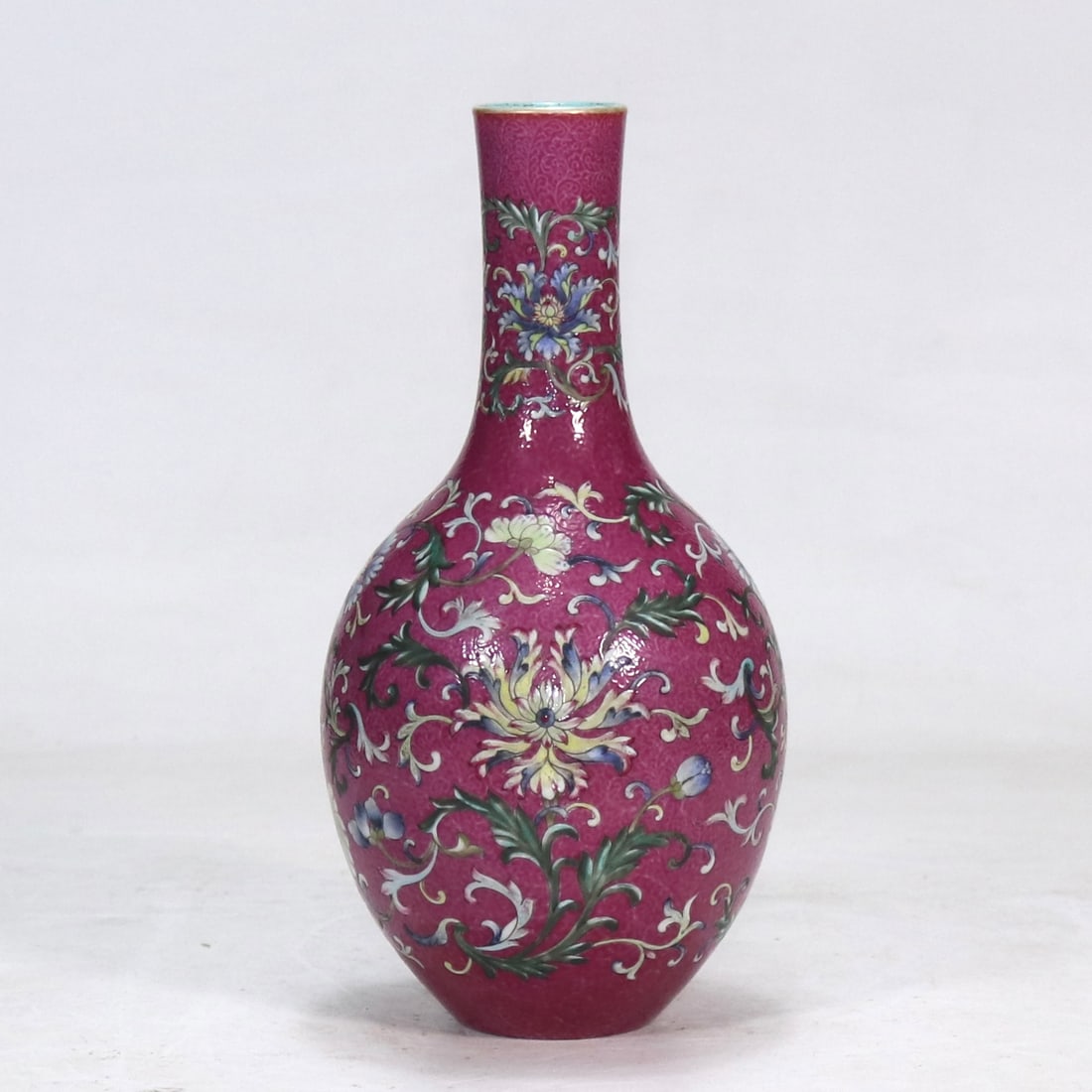 A Exquisite Ruby Red Glazed Famille Rose Lotus Pattern Vase: A Exquisite Ruby Red Glazed Famille Rose Lotus Pattern Vase,Qing Dynasty, China,Qianlong Four-character Mark,Size:8.3in