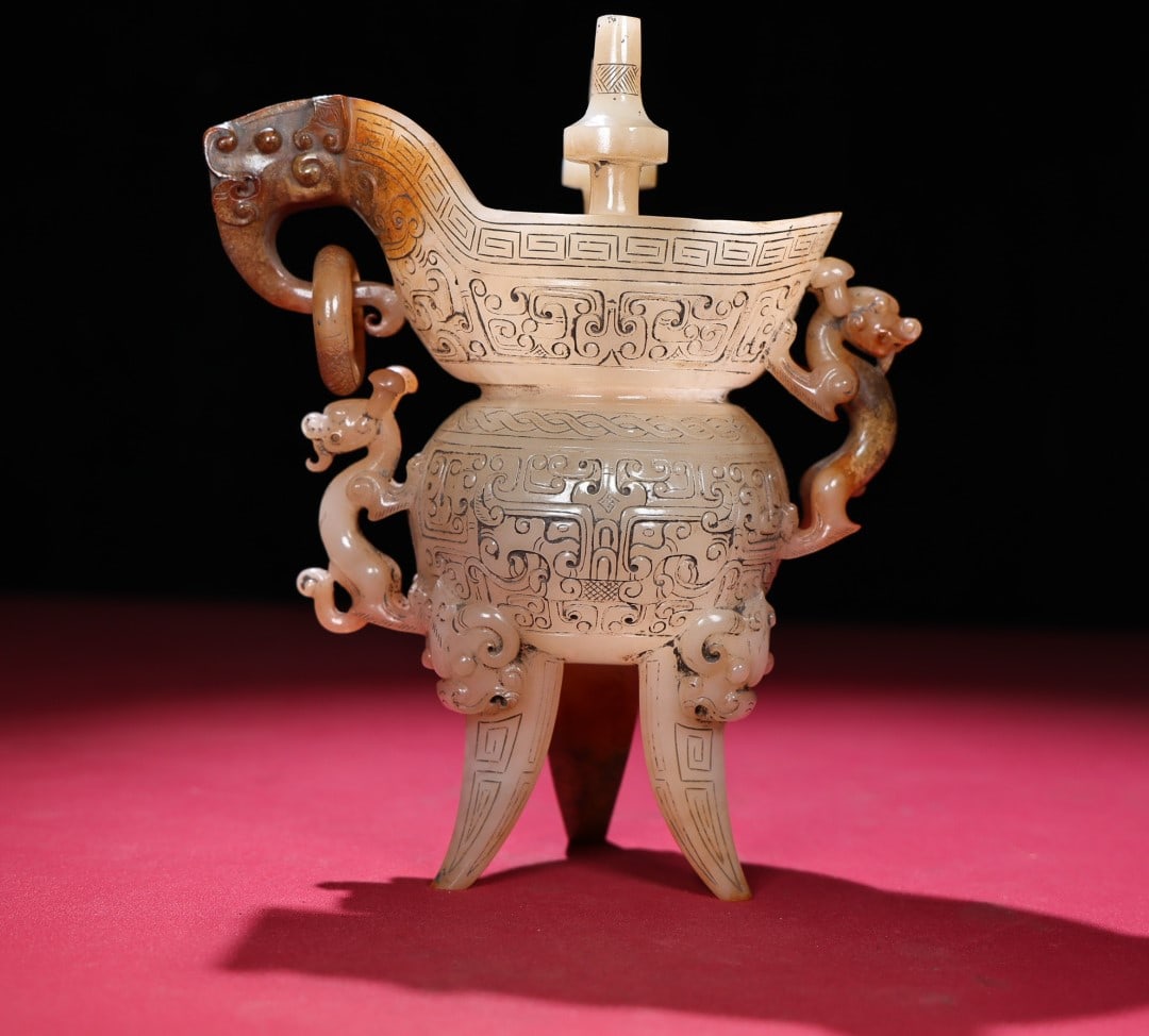 A Exquisite Hetian Jade Tripod Goblet: A Exquisite Hetian Jade Tripod Goblet,Han Dynasty, China,Size:7inx5.9inx3in,Weight:734g 和田玉三足爵杯,中国汉代