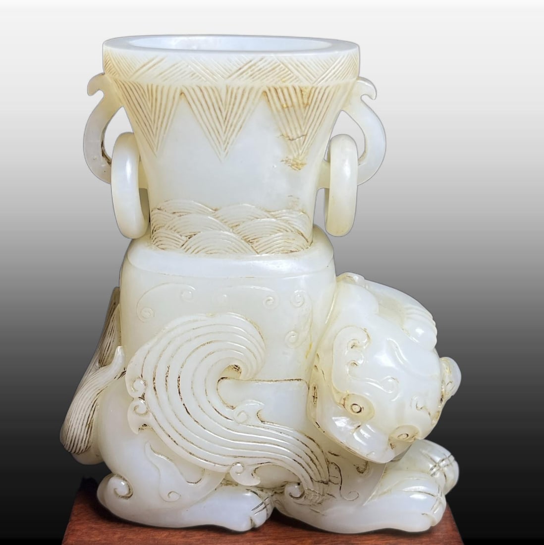 A Exquisite Hotan Jade Auspicious Beast Ornament: A Exquisite Hotan Jade Auspicious Beast Ornament,Qing Dynasty, China,Size:3.3inx2.1inx3.7in,Weight:377g 和田玉瑞兽摆件,中国清代