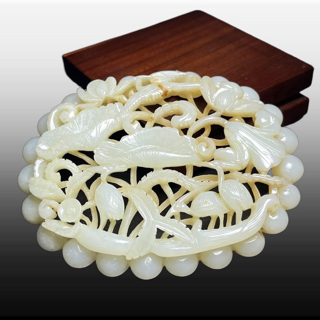 A Exquisite Hotan Jade Lotus Leaf Pattern Ornament: A Exquisite Hotan Jade Lotus Leaf Pattern Ornament,Qing Dynasty, China,Size:4inx0.5inx3in,Weight:82g 和田玉荷叶纹摆件,中国清代