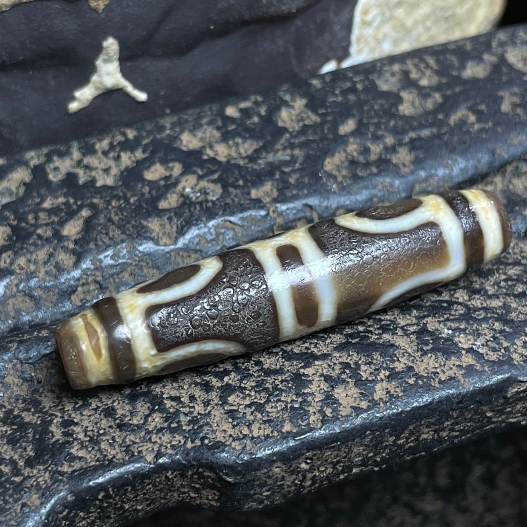 A Exquisite Tiger Tooth Dzi bead - 2